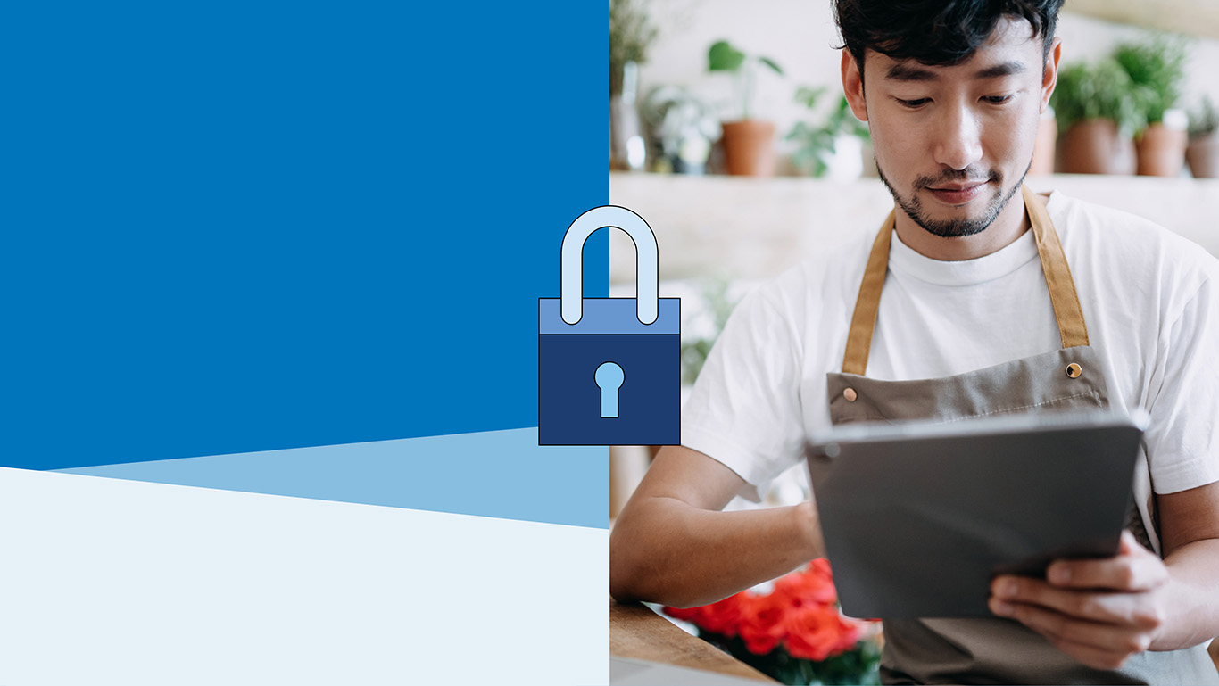 older woman on a laptop with a graphic of a padlock beside